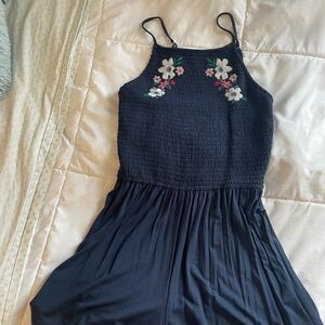 Hollister navy floral romper.